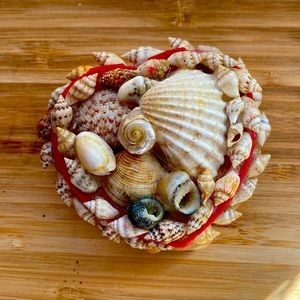 Vintage heart shaped shell trinket or jewellery box made of sea shells